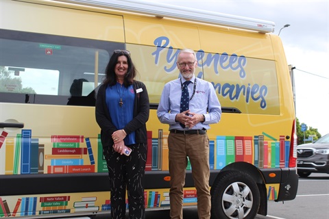 Exterior photo of mobile library showing librarians Peter and Tammy