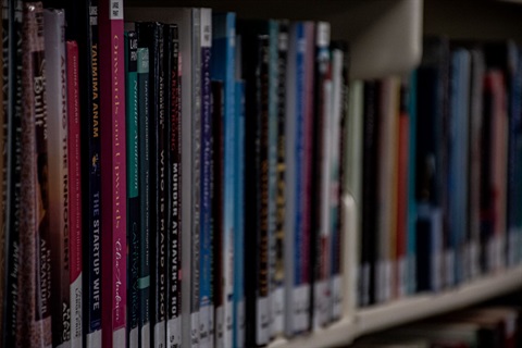 A row of books on a shelf